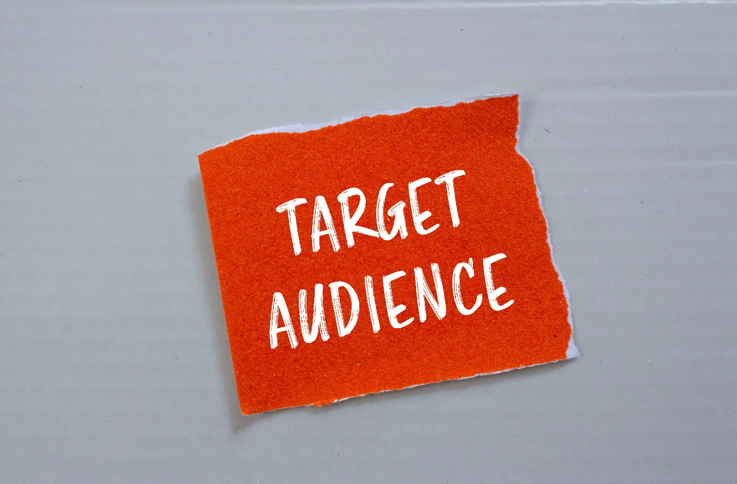 Red paper with "TARGET AUDIENCE" written