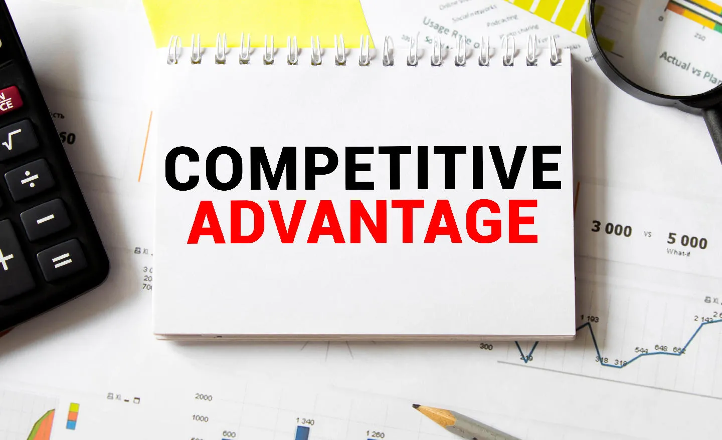 Notebook with "COMPETITIVE ADVANTAGE"